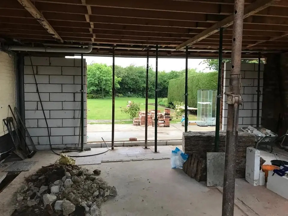 Garage opened up with temporary propping before the new structure was installed
