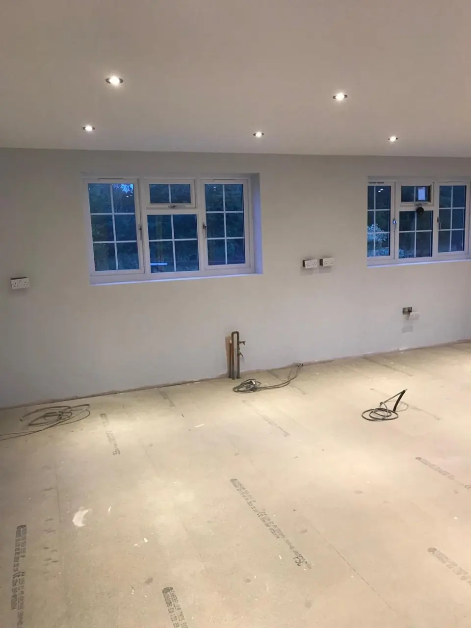 Converted open-plan room plastered and ready for the fitted interior