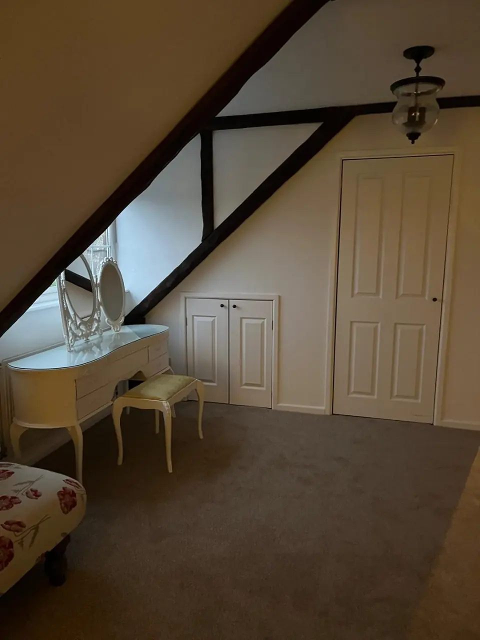 Finished-project photograph showing the built-in storage and dressing area