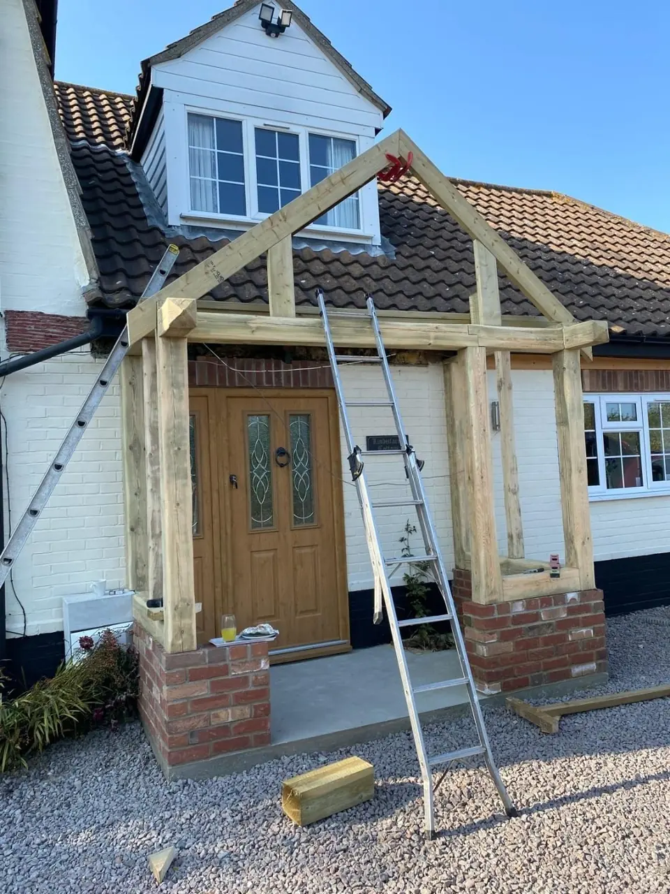 Oak frame erected on the new brick plinths