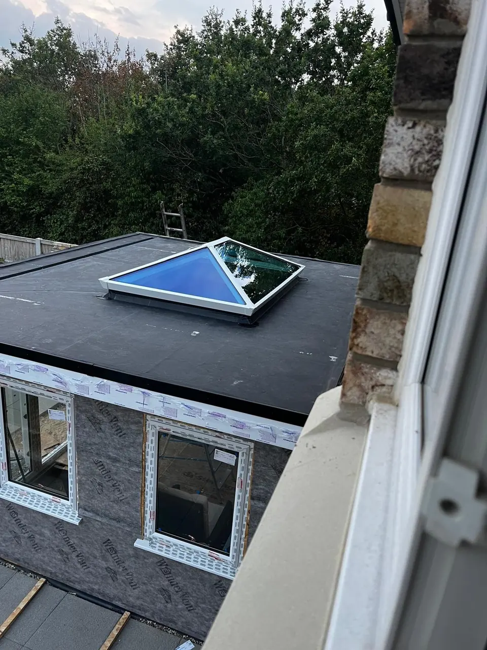 Roof lantern fitted to the flat roof of the timber extension, viewed from above