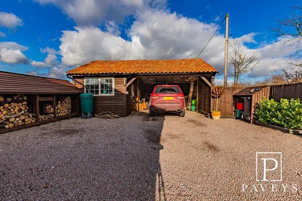 Finished car port - professional Paveys shot