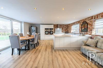 Completed kitchen with brick slip feature wall